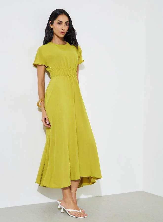 ستايلي Green Solid Ruched Detail A-Line Midi Dress