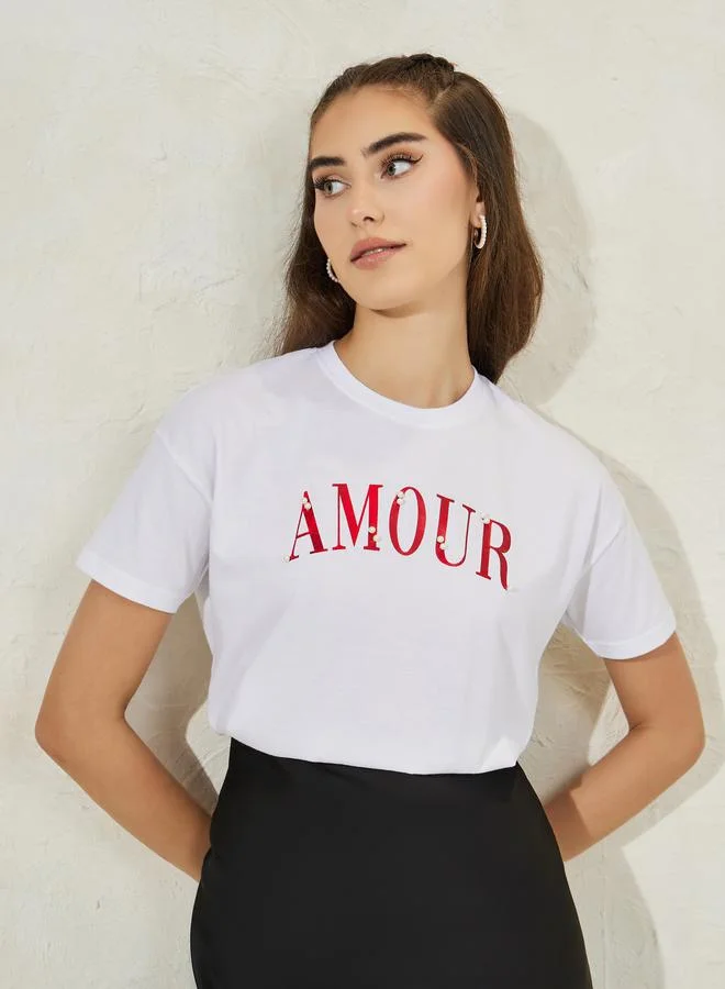 Styli Regular Fit Dropped Shoulder Amour Rhinestone Slogan T-Shirt