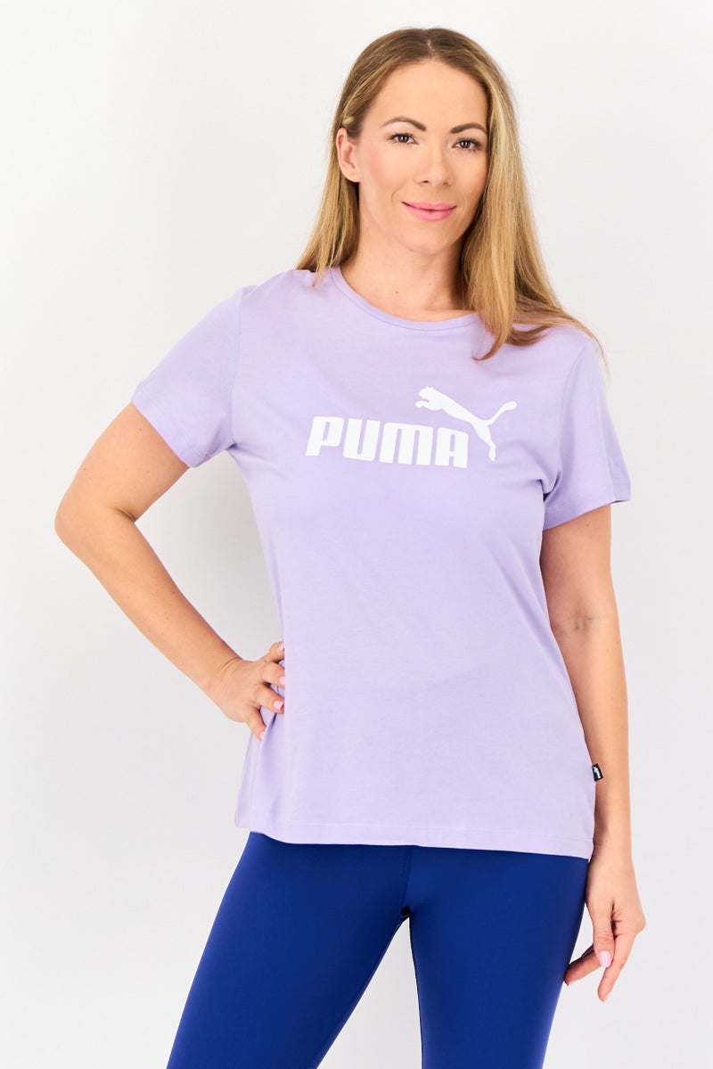 PUMA Women Sportswear Fit Short Sleeve Outdoor T-Shirt, Purple - Image 1