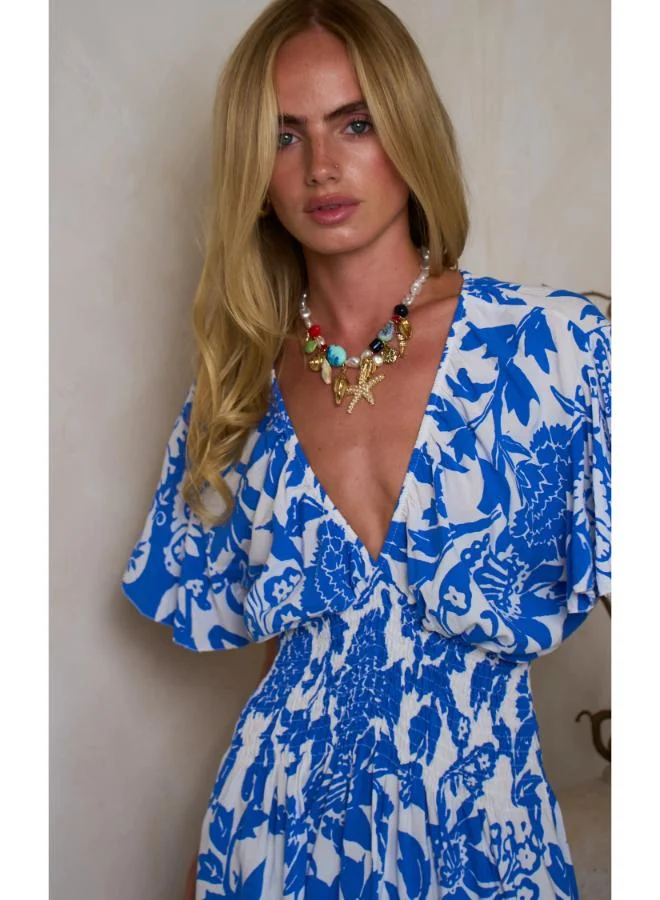 Hoxton Gal Blue Floral Mini Dress – V‐Neck, Short Ruffle Sleeves & Shirred Waist