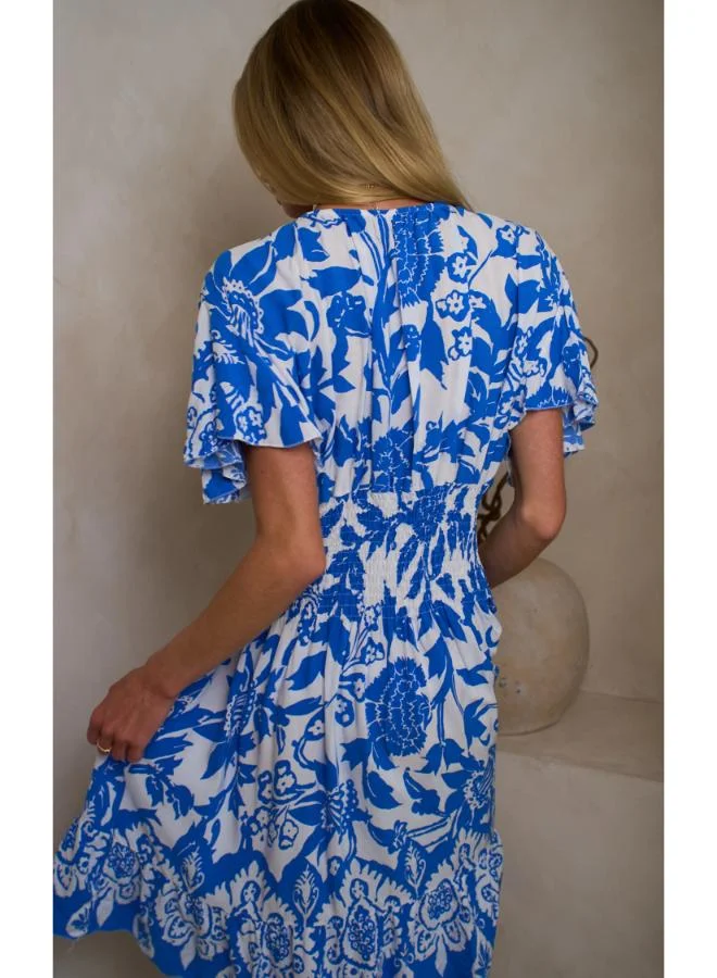 Hoxton Gal Blue Floral Mini Dress – V‐Neck, Short Ruffle Sleeves & Shirred Waist