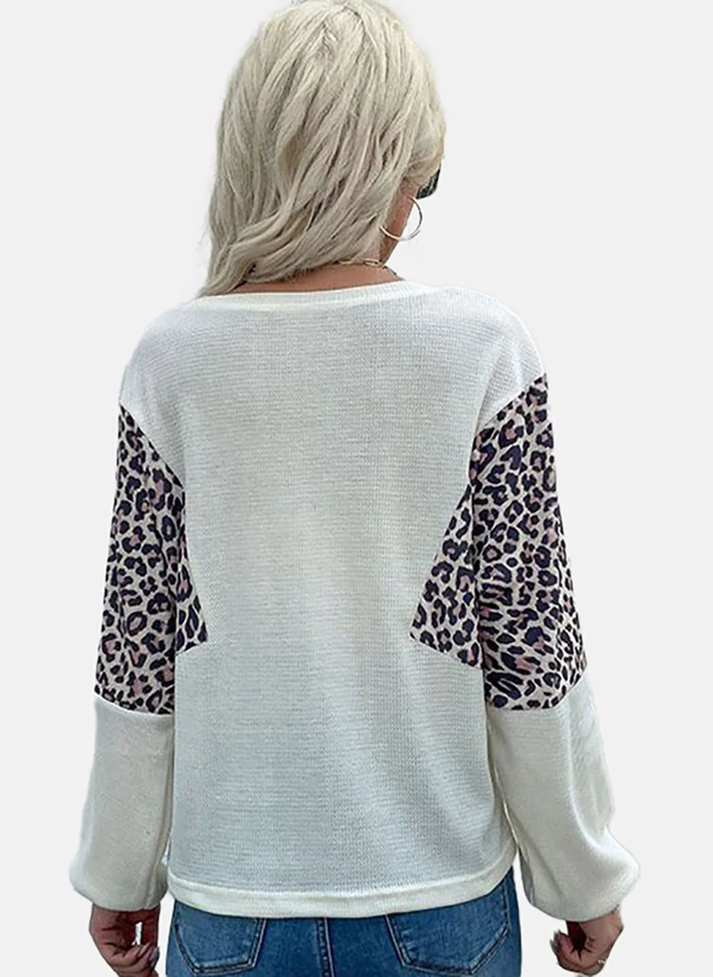 يونيكي Print Bell Sleeve Top