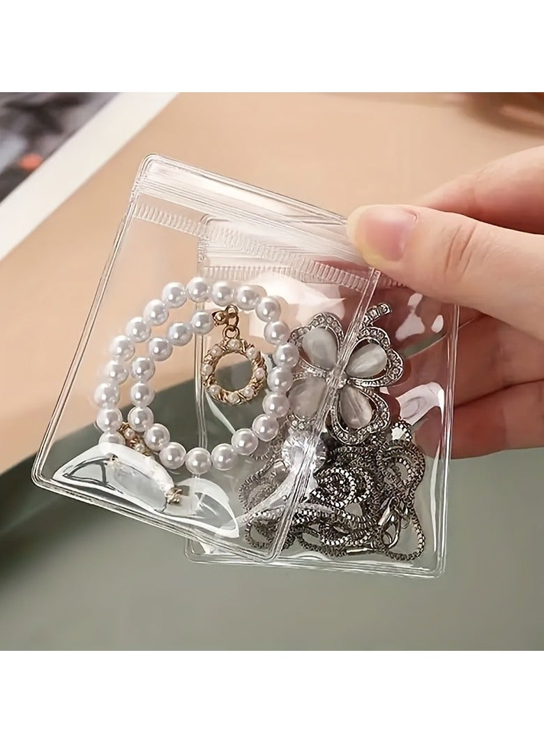 عبوة من 30 كيس مجوهرات شفاف بسحاب من مادة PVC - أكياس تخزين مقاومة للماء للأقراط والقلائد والأساور | منظم متين بسحاب لحفظ المجوهرات والخرز وعرض الإكسسوارات - Image 4