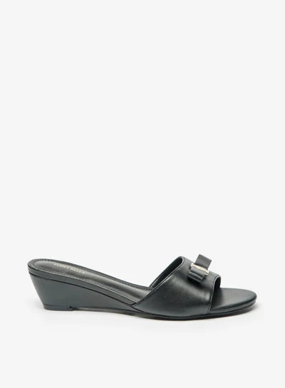 فلورا بيلا من شو إكسبرس Womens Logo Accented Slip On Sandals With Wedge Heels By Shoexpress
