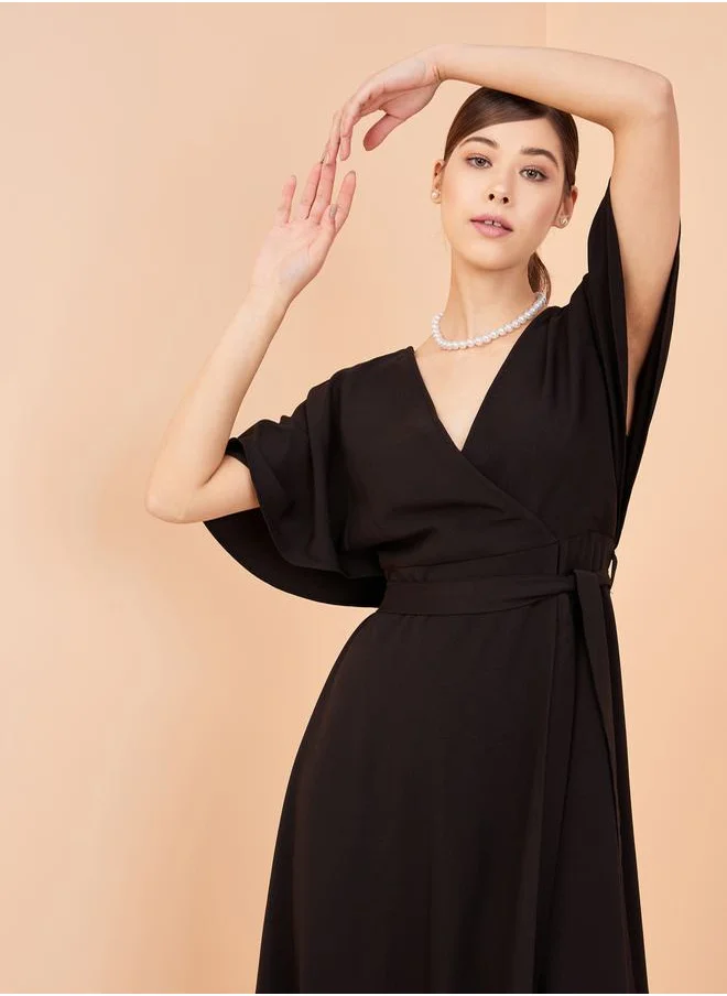 FEMELLA V Neck Wrap Front Maxi Dress by Styli