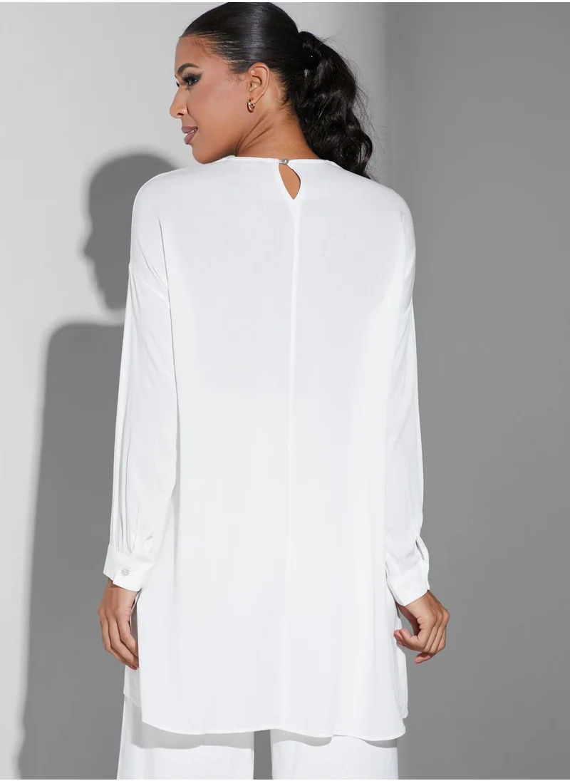 Namshi x Modanisa Embroidered Pleat Detail Tunic