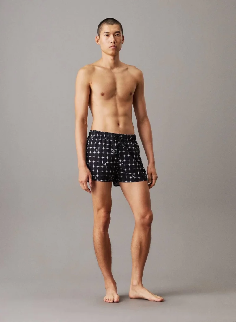 Calvin Klein Jeans  Short Drawstring Swim Shorts - CK Monogram for Men | Best Price UAE