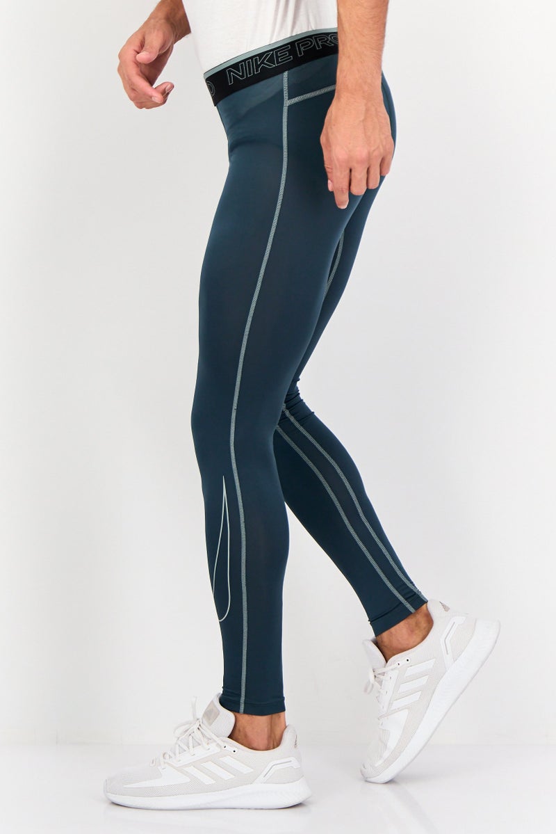 Nike سروال تدريب ضيق للرجال بشعار العلامة التجارية، أخضر داكن - Image 4