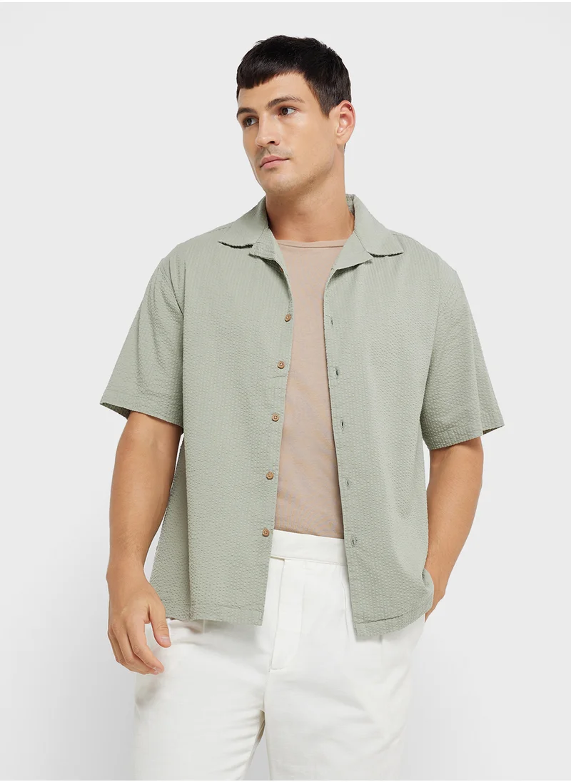 ريبلز مع نمشي MEN'S OVERSIZED SHIRT