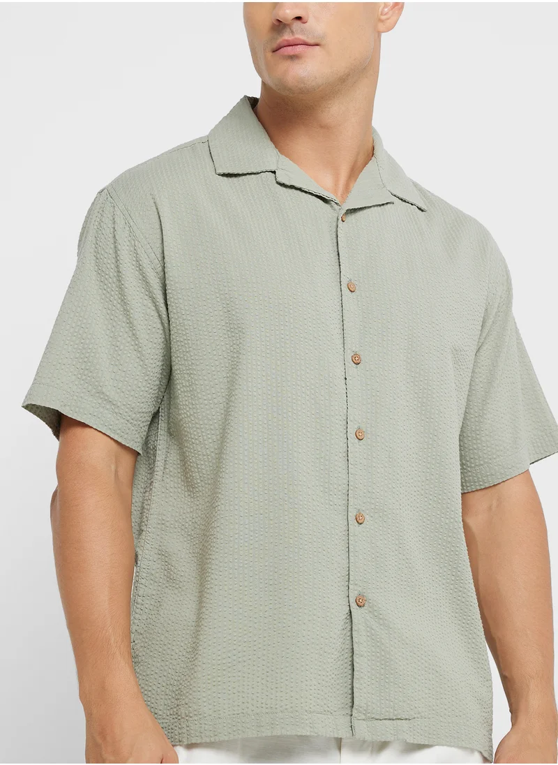 ريبلز مع نمشي MEN'S OVERSIZED SHIRT