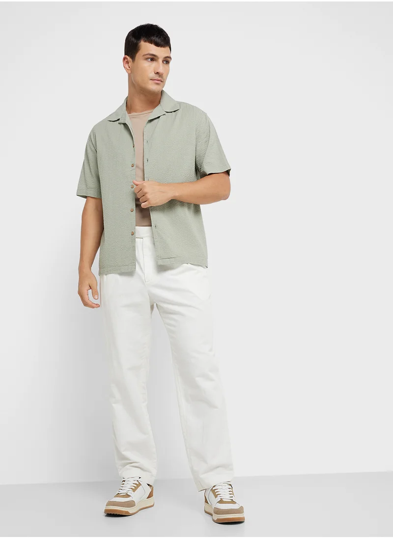ريبلز مع نمشي MEN'S OVERSIZED SHIRT