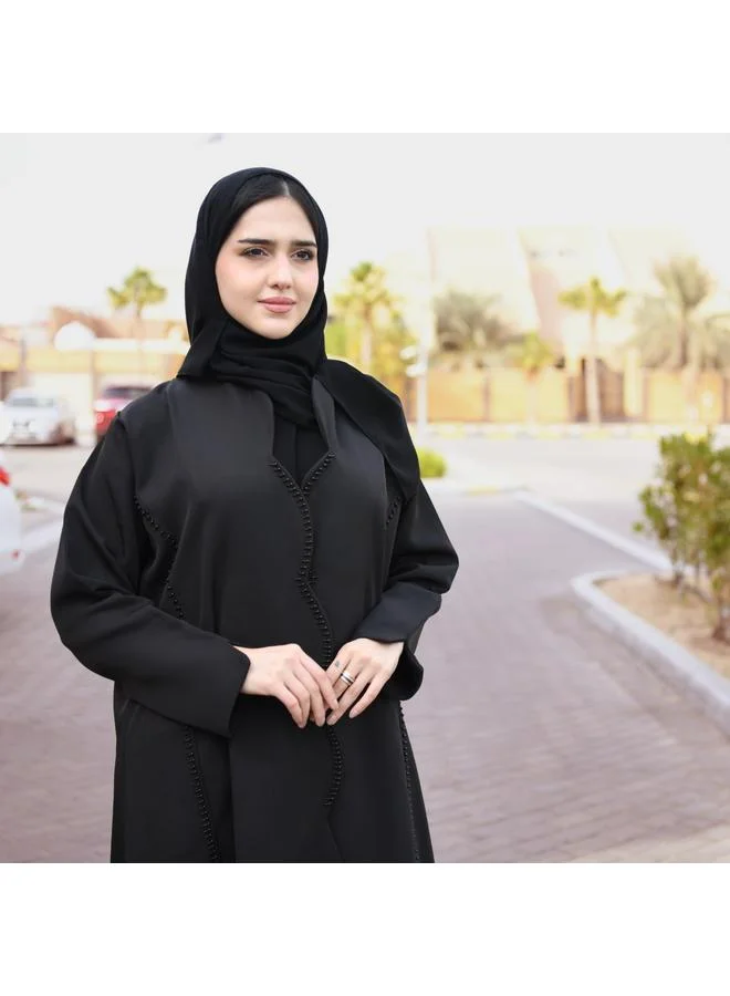 عبايات حوراء عباية سوداء بقصة مميزة من الامام مزينة بشك