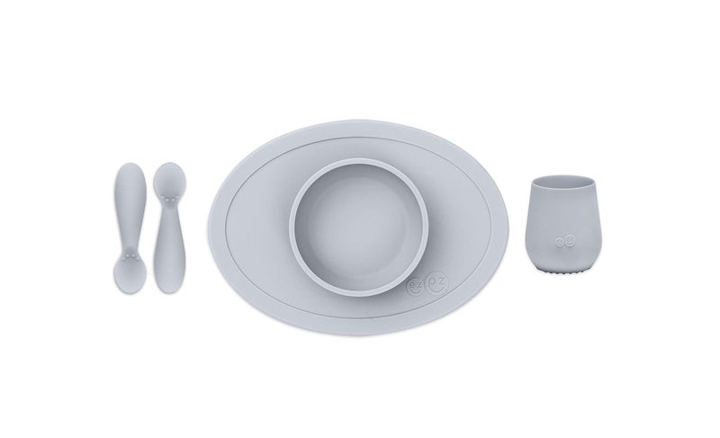 ezpz First Food Set - 100% Food Grade Silicone Suction Bowl with Built-in Placemat, Training Cup & Spoon - Designed by a Pediatric Feeding Specialist - Promotes Self Feeding - 6 Months+ (Pewter) - Image 1