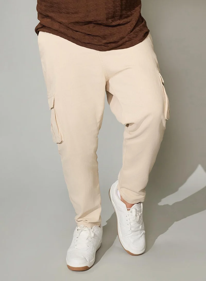 Instafab Plus Instafab Plus Men's Khaki Beige Chino Cargo Trousers For Casual Wear | Mid-Rise | Regular Fit | Button Closure | Plus-Size Cargo Pant Crafted With Comfort Fit For Everyday Wear