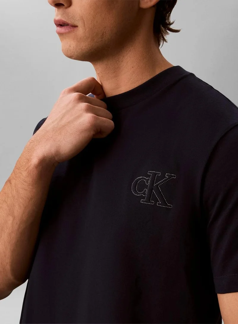 Calvin Klein Jeans Dark Sapphire Relaxed Embossed Logo T-Shirt for Men | Best Price UAE