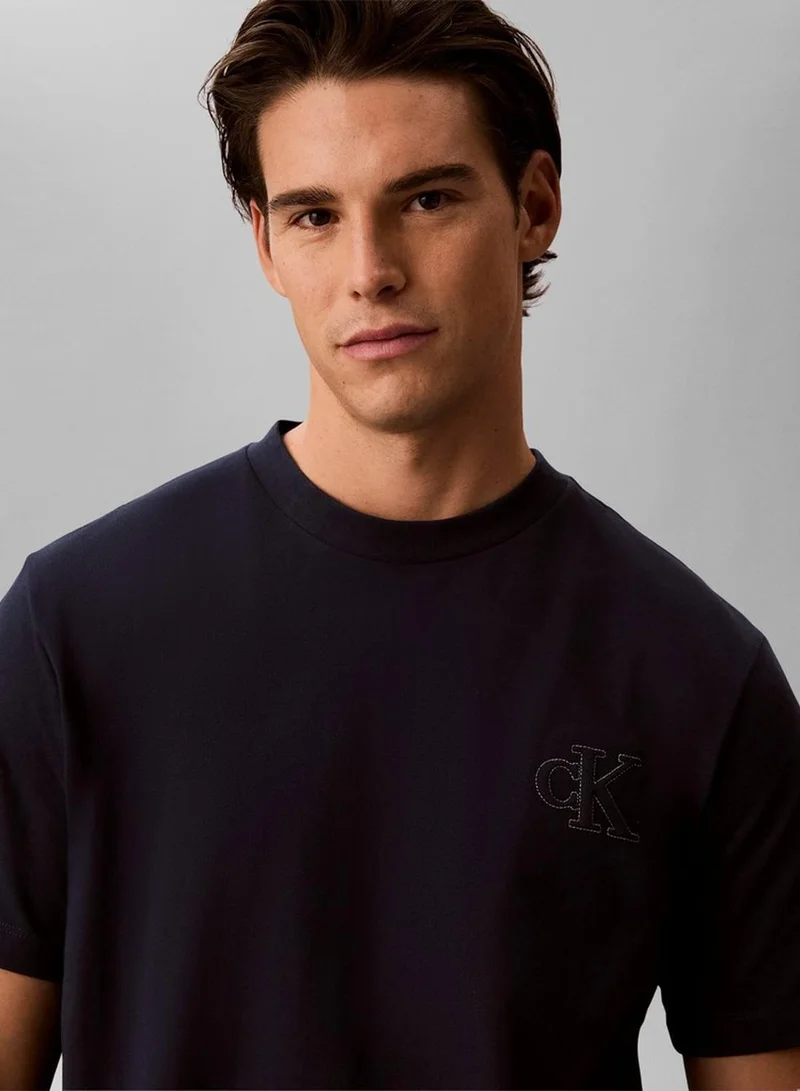 Calvin Klein Jeans Dark Sapphire Relaxed Embossed Logo T-Shirt for Men | Best Price UAE