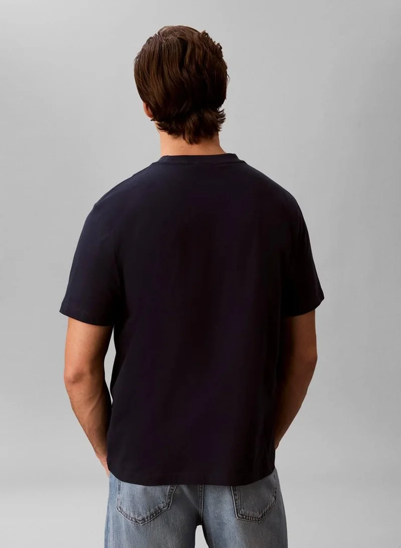 Calvin Klein Jeans Dark Sapphire Relaxed Embossed Logo T-Shirt for Men | Best Price UAE