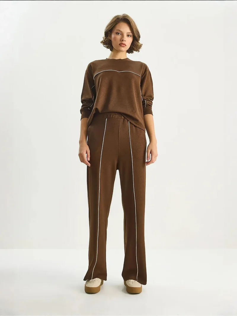 بيانكو لوتشي طقم نسائي قطعتين مخطط بخصر عالٍ وأكمام طويلة