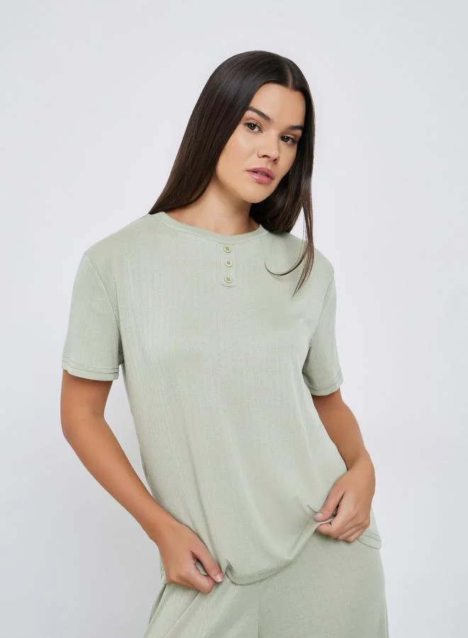 ستايلي طقم بيجاما من بنطال واسع وتيشيرت بياقة دائرية