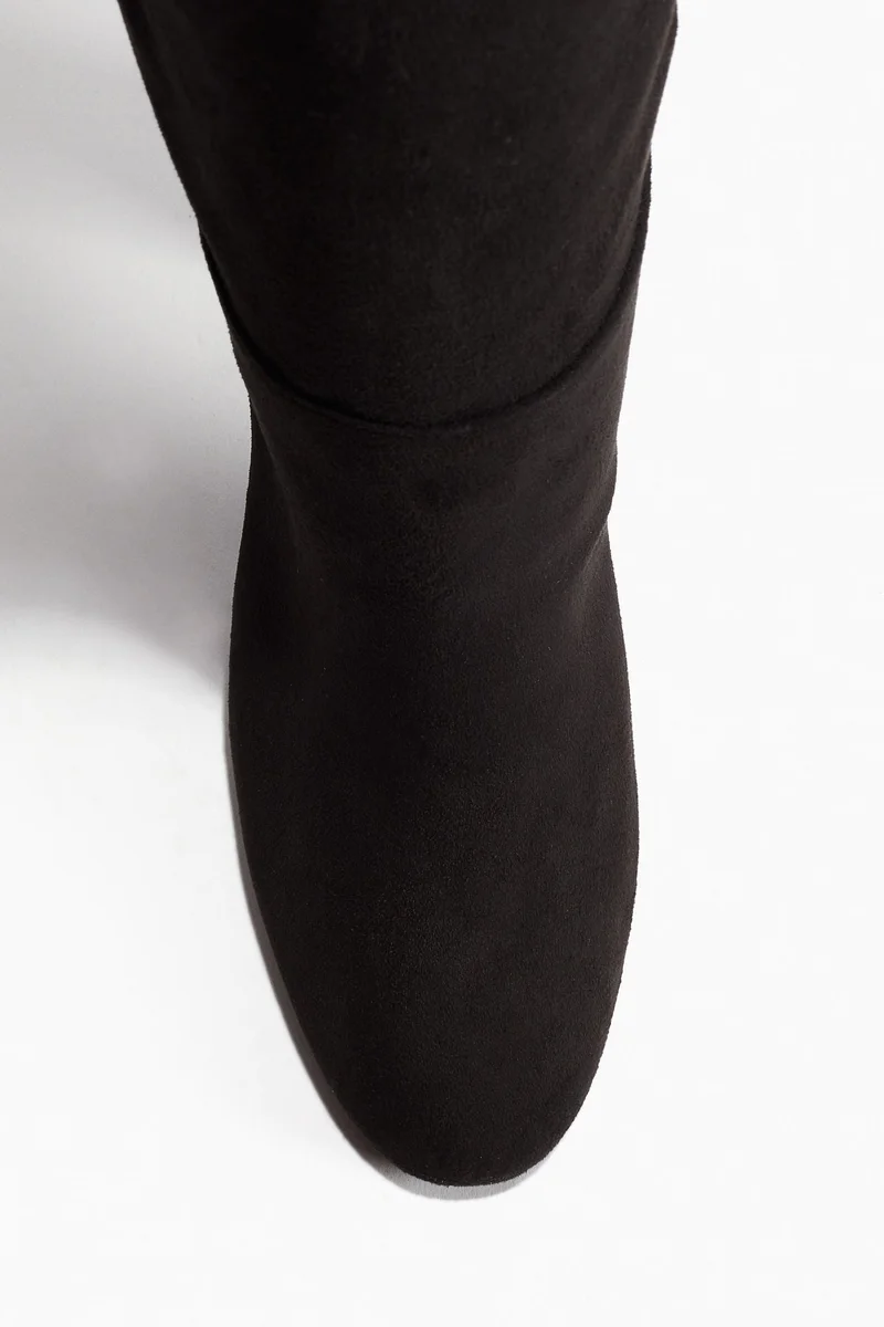 Knee-high heeled boots