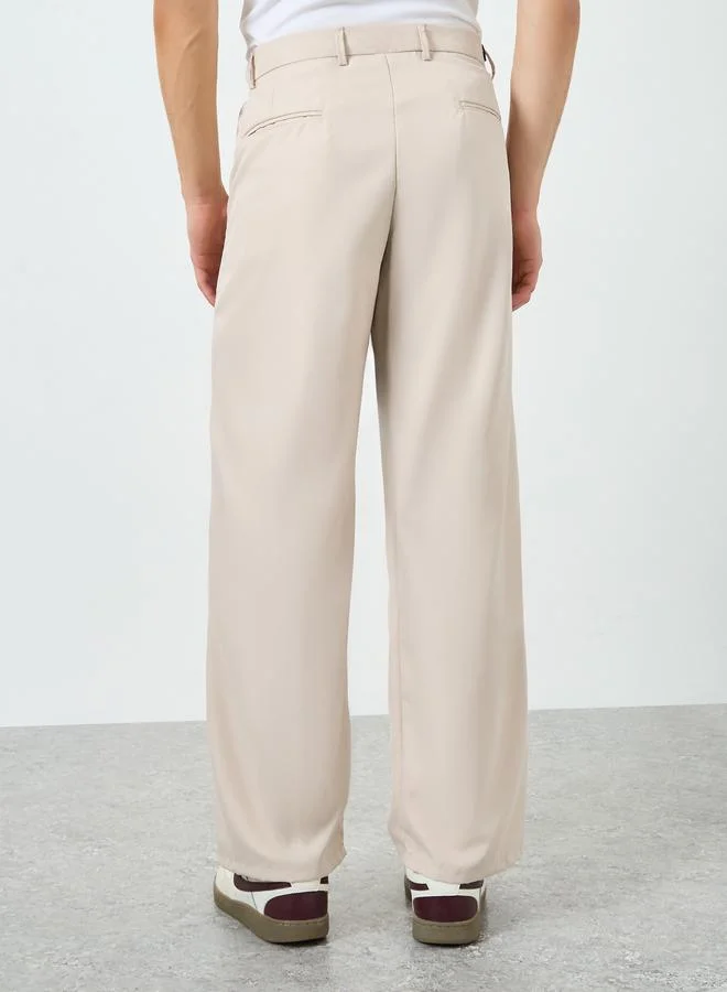 Styli Beige Men Fold Pleat Wide Leg Pants for Men | Best Price UAE