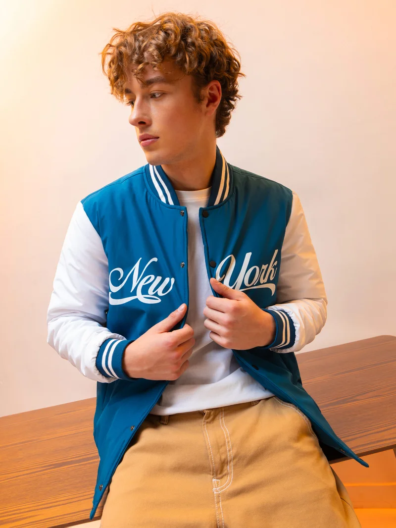 Beyoung Teal Blue Printed Varsity Jacket for Men