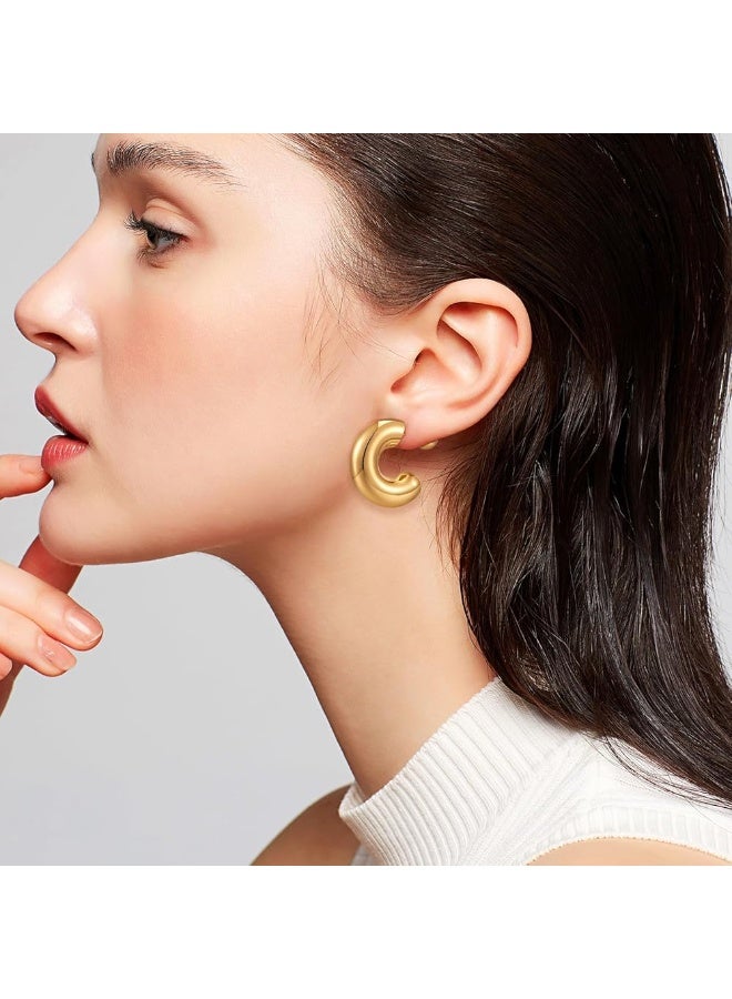 Luxuria Thick hoop earrings with a C-shaped design, featuring a ball back closure or a design known as a Kelly tube hoop. - Image 3