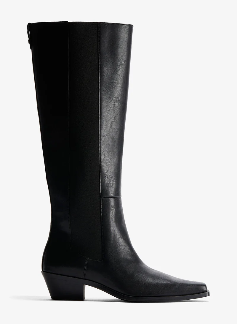 اتش اند ام بووت بطول يصل للركبة