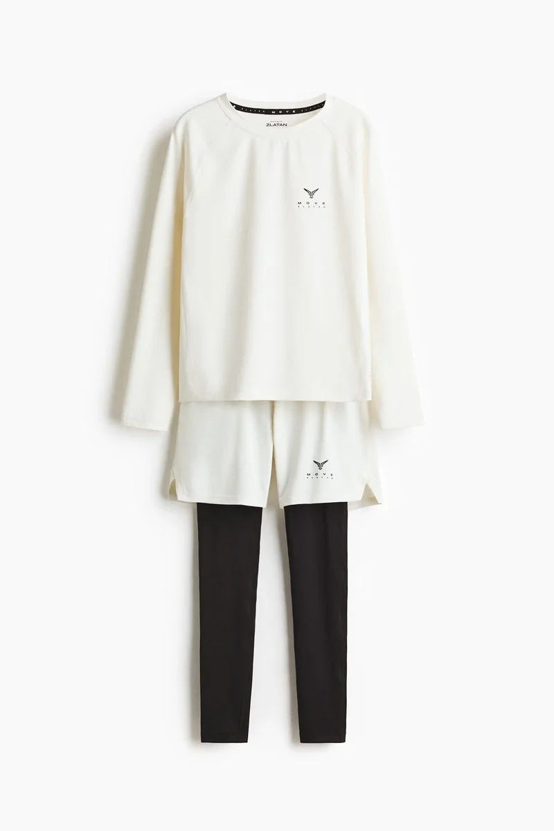 اتش اند ام بلوزة رياضية من نسيج دراي موف