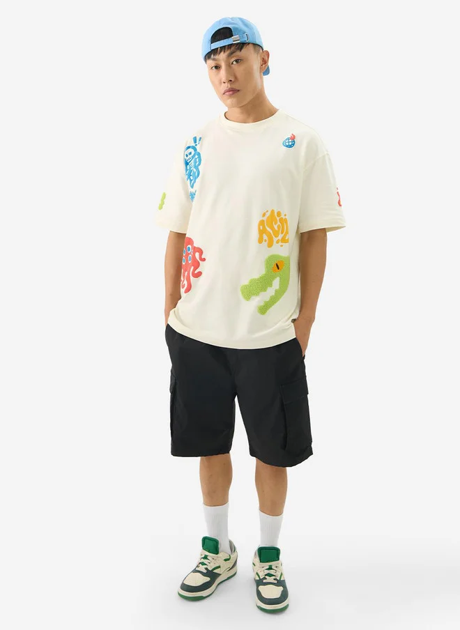 The Souled Store  The Souled Store Acid Drip Oversized Printed T-Shirt for Men  | Best Price UAE