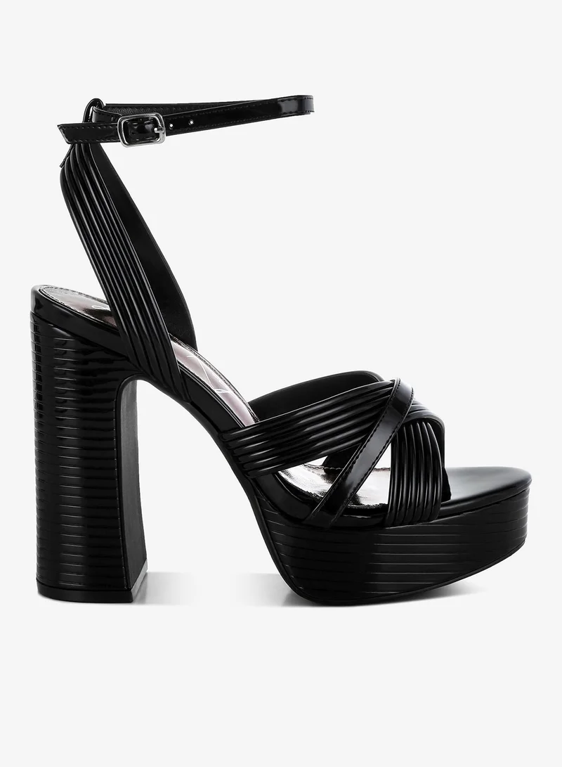 لندن راج صندل بكعب معدني حول الكاحل باللون الأسود