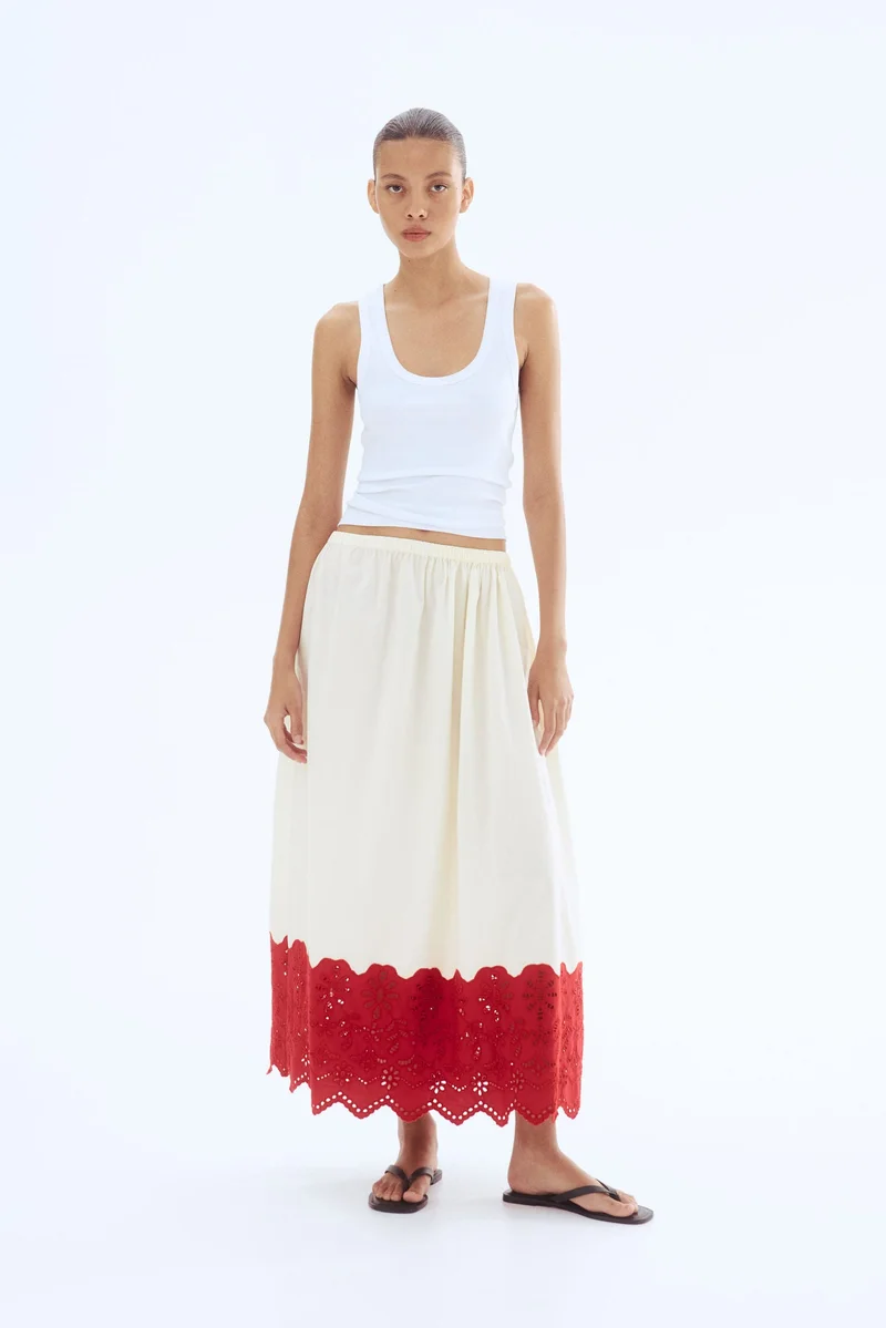 اتش اند ام تنورة من البوبلين بتفاصيل ثقوب