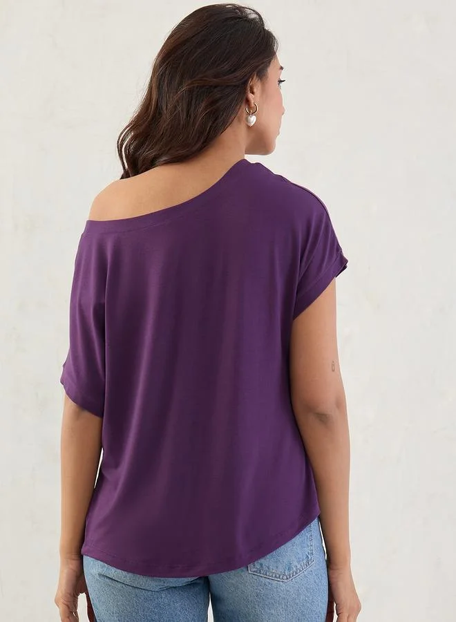 فيميلا بلوزة محبوكة بنفسجية بكتف واحد