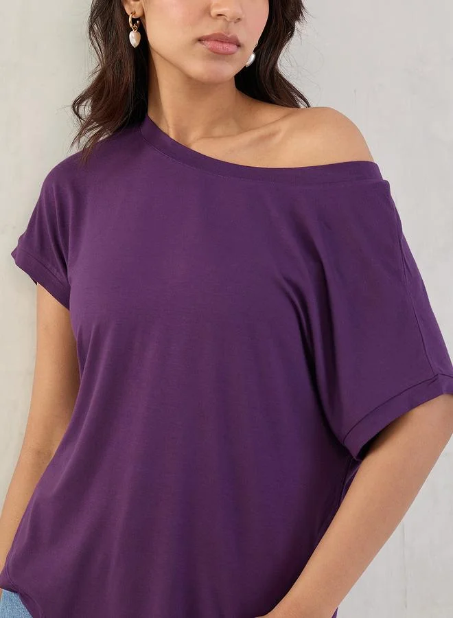 فيميلا بلوزة محبوكة بنفسجية بكتف واحد