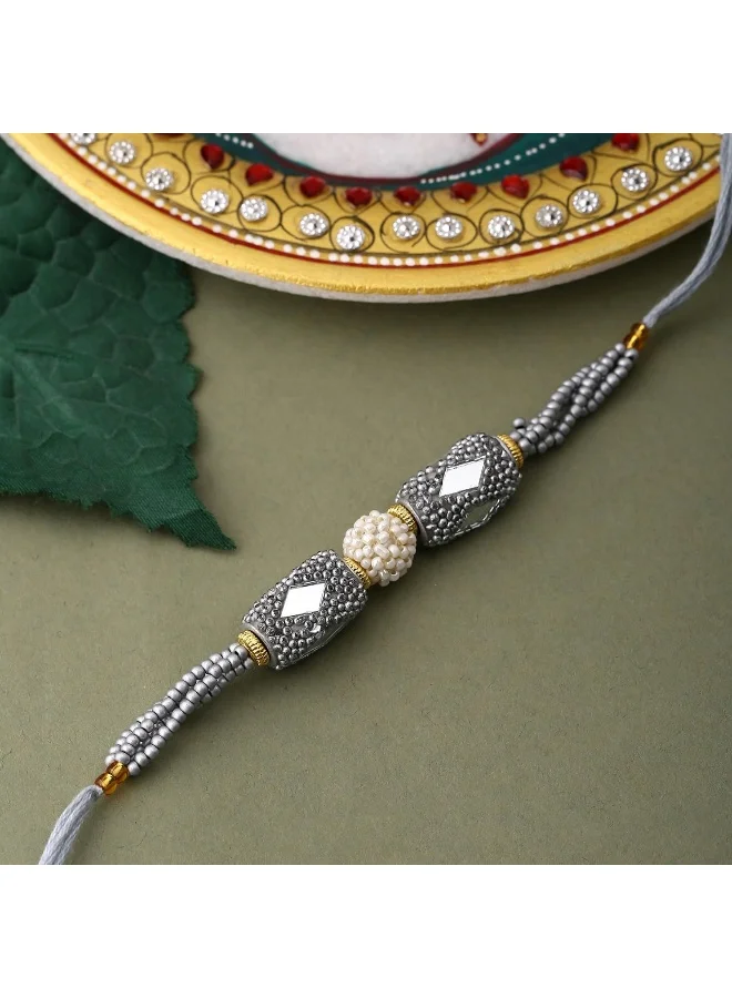 VOYLLA Silver Beaded And Pearls Rakhi With Roli Chaawal Pack