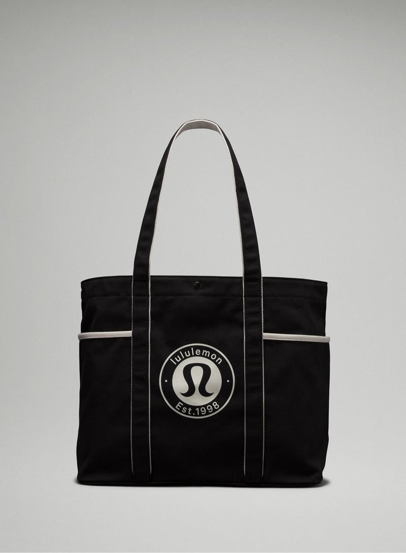 لولوليمون حقيبة قماشية كبيرة متعددة الجيوب للنساء والرجال - حقيبة متينة للتسوق والسفر والعمل (سعة 20 لترًا) - خفيفة الوزن وصديقة للبيئة - Image 1