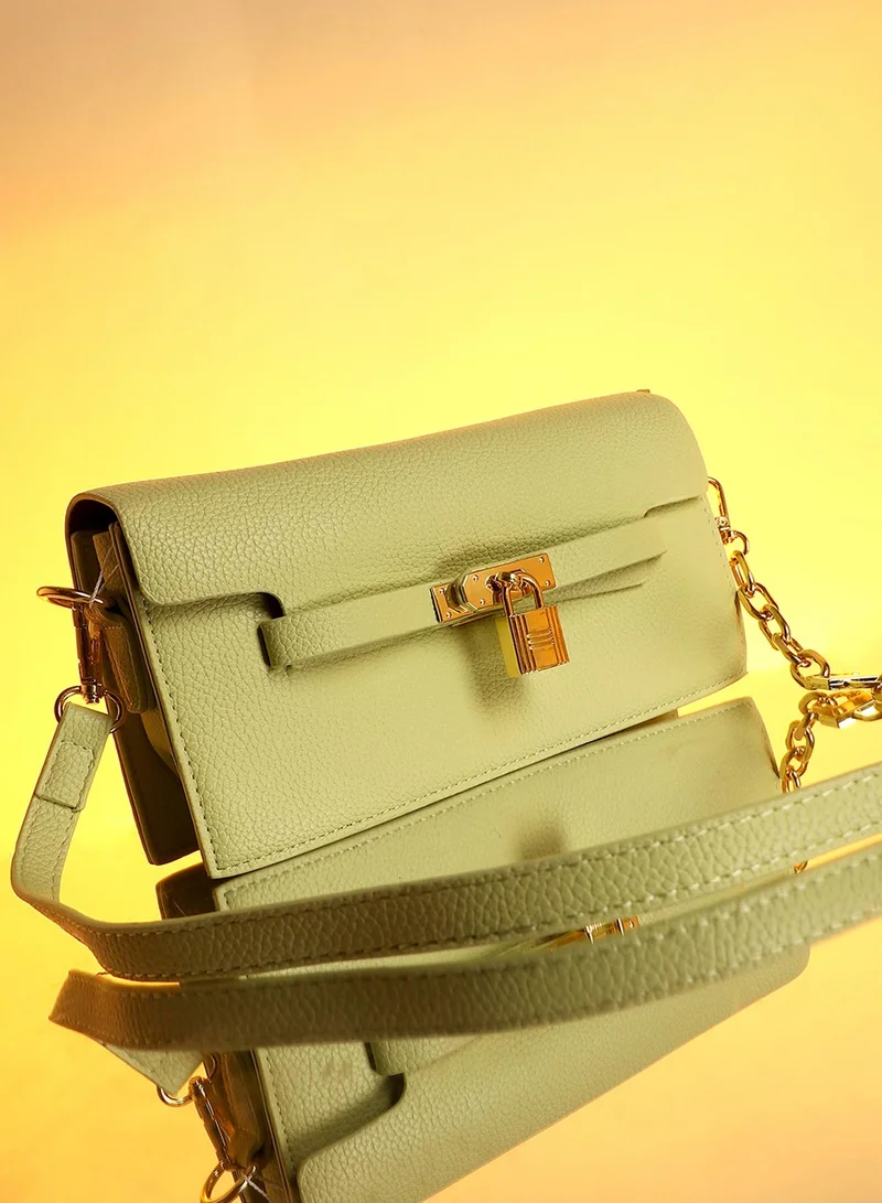 Haute Sauce Solid Magnet Lock Regular Vegan Leather Sling Bag with Detachable Strap For Women