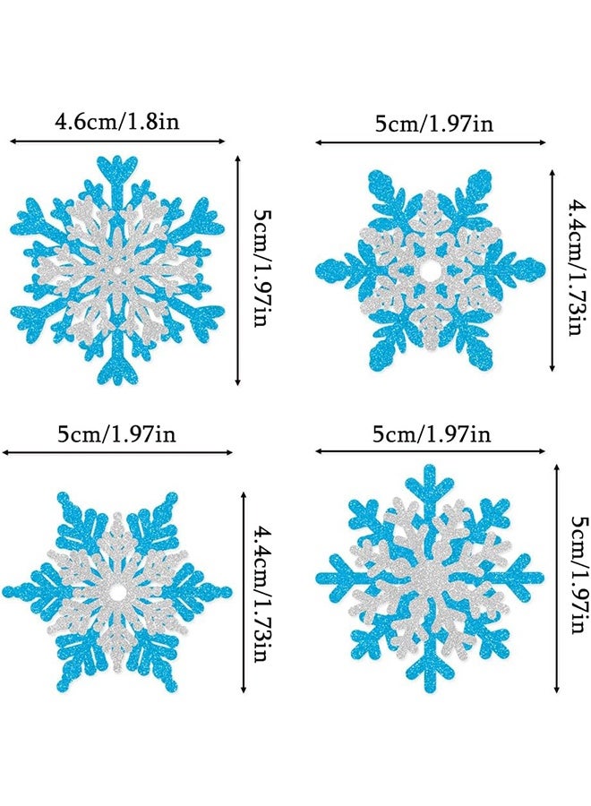 مجموعة تزيين كعك مكونة من 16 قطعة، زينة كعك لامعة لفصل الشتاء، أغطية كب كيك على شكل ندفة ثلج مزدوجة الطبقات باللونين الفضي والأزرق بموضوع شتوي، لوازم تزيين الكيك لحفلات استحمام الأطفال وأعياد ميلاد الأطفال - Image 2