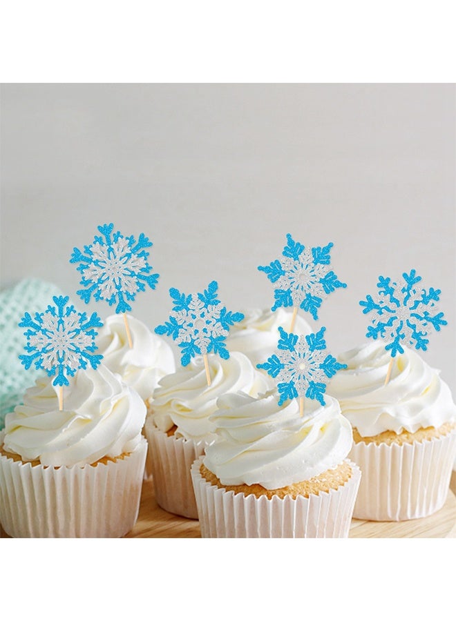 مجموعة تزيين كعك مكونة من 16 قطعة، زينة كعك لامعة لفصل الشتاء، أغطية كب كيك على شكل ندفة ثلج مزدوجة الطبقات باللونين الفضي والأزرق بموضوع شتوي، لوازم تزيين الكيك لحفلات استحمام الأطفال وأعياد ميلاد الأطفال - Image 4