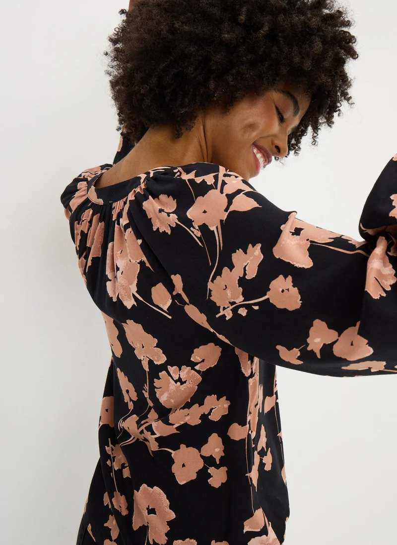 ماتلان بلوزة وردية بنقوش زهور