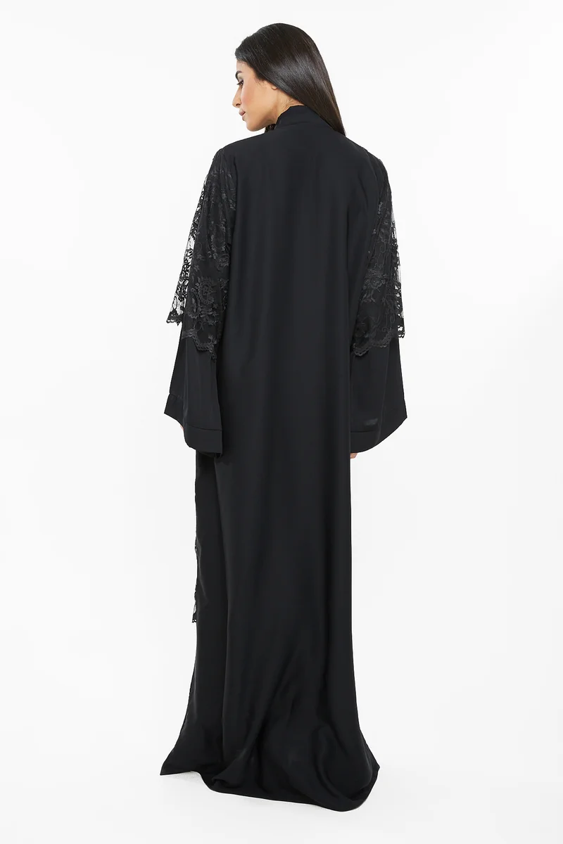 NUKHBAA A sensuous abaya with a floral knitted top layer .-AJ102A