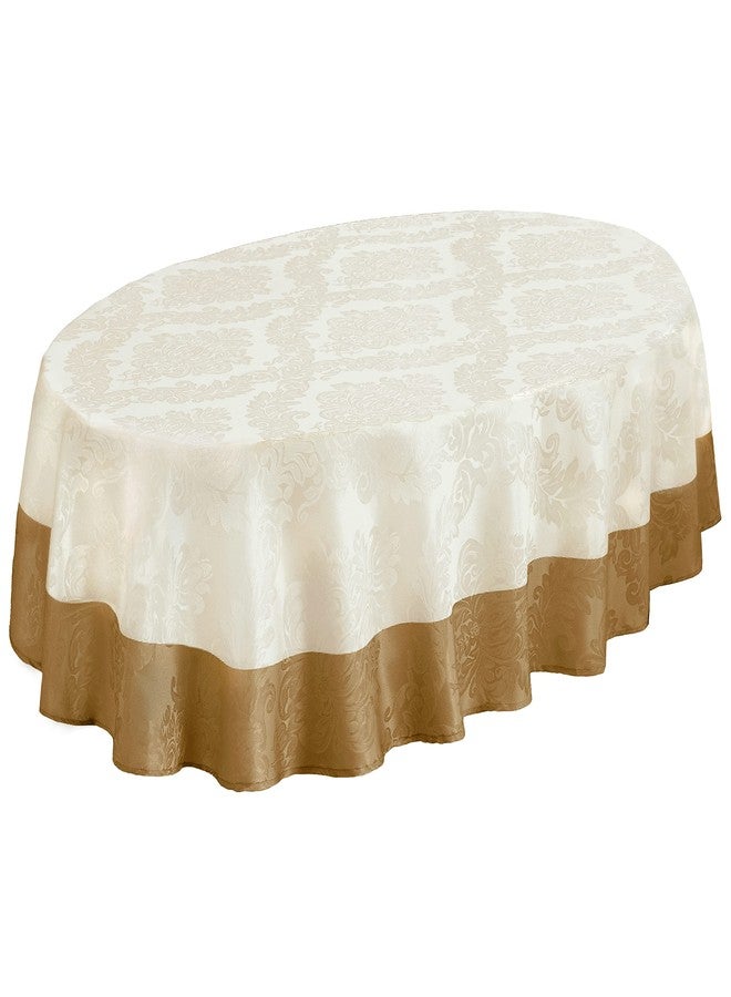 Newbridge Valencia Two Tone Bordered Damask Fabric Tablecloth, Wrinkle and Stain Resistant Fine Dining Holiday Hotel Quality Tablecloth, 60 Inch x 84 Inch Oval, Antique Ivory/Gold - Image 2