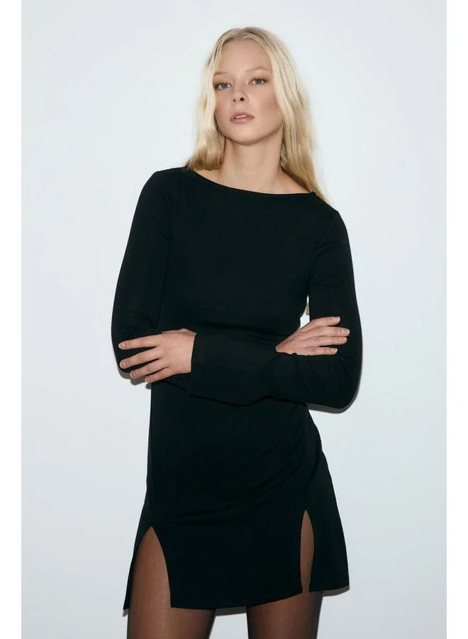 GRIMELANGE MONSENA Women's Soft and Stretch Fabric Waist-Accentuating Slit Mini Black Dress.