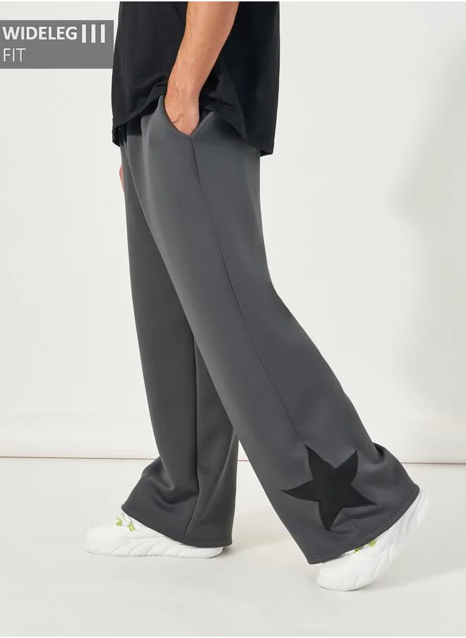 Styli Styli Wide Leg Contrast Star Patch Joggers with Drawstring