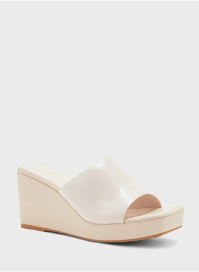 ايلا Textured Mule Wedge Sandal