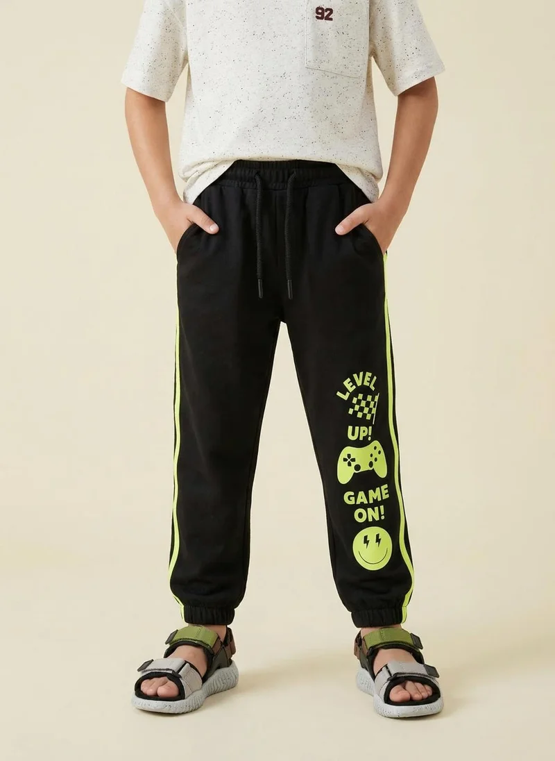 نوتيناتي Nautinati Boys’ 100% Cotton Black Gamer Graphic Joggers with Contrast Piping