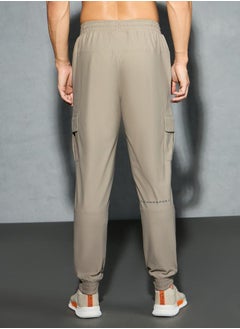 Technosport Solid 4-Way Stretch Cargo Pants by Styli  - Image 3