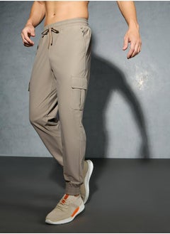 Technosport Solid 4-Way Stretch Cargo Pants by Styli  - Image 2