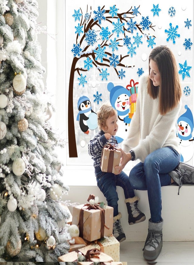 وولاين مجموعة ملصقات نوافذ شتوية كبيرة من 6 أوراق من Whaline، ملصقات نوافذ قابلة لإعادة الاستخدام على شكل ندفة ثلج وشجرة ورجل ثلج وبطريق، لتزيين النوافذ الزجاجية المنزلية في حفلات عيد الميلاد (أزرق) - Image 3