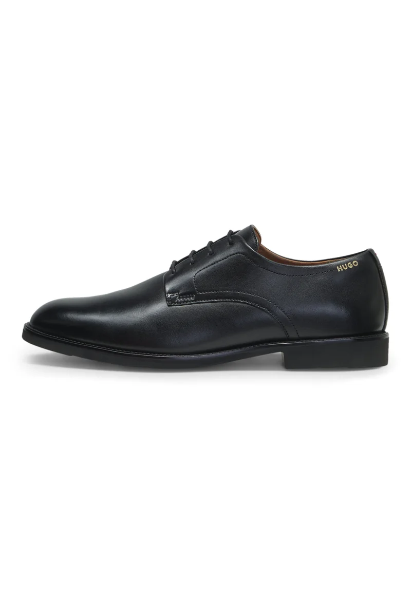 HUGO Black Derby shoes in smooth leather with embossed logo for Men | Best Price UAE